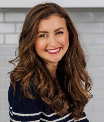 Natasha Kravchuk Smiling in her kitchen